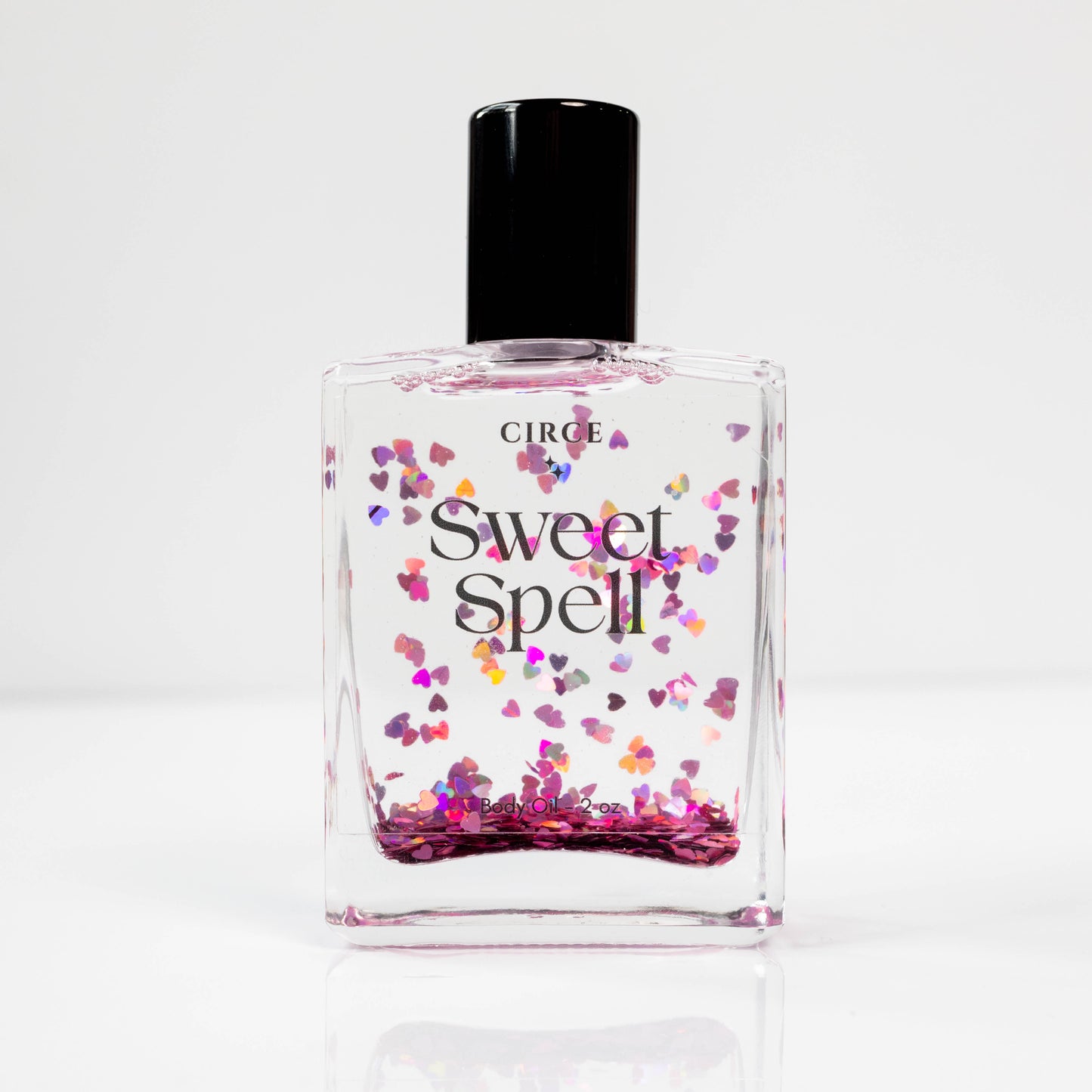 Sweet Spell Body Oil 2 oz. - Watermelon Candy Scented  from Circe Boutique