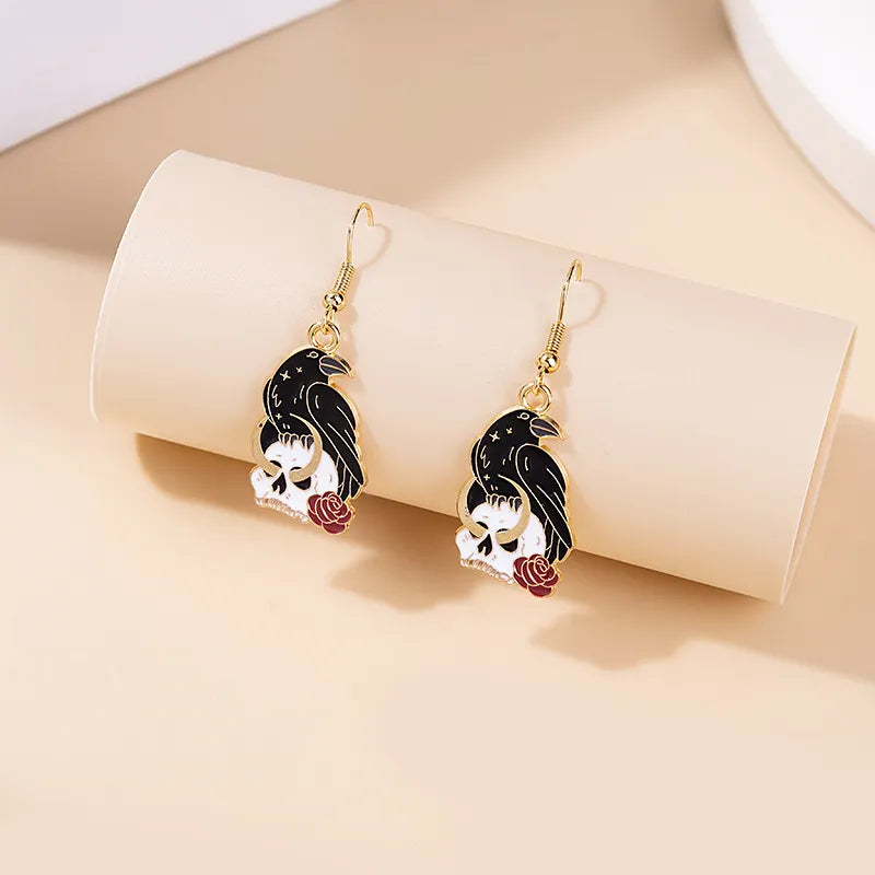 E155 - Enamel Raven and Skull Earrings - Jewelry  from CirceBoutique