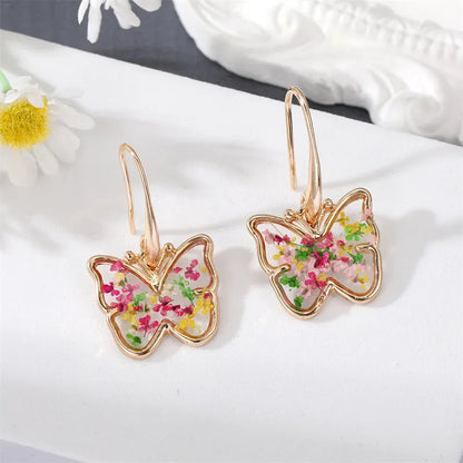 E95-Pressed Flower Butterfly Earrings - Jewelry  from Shein